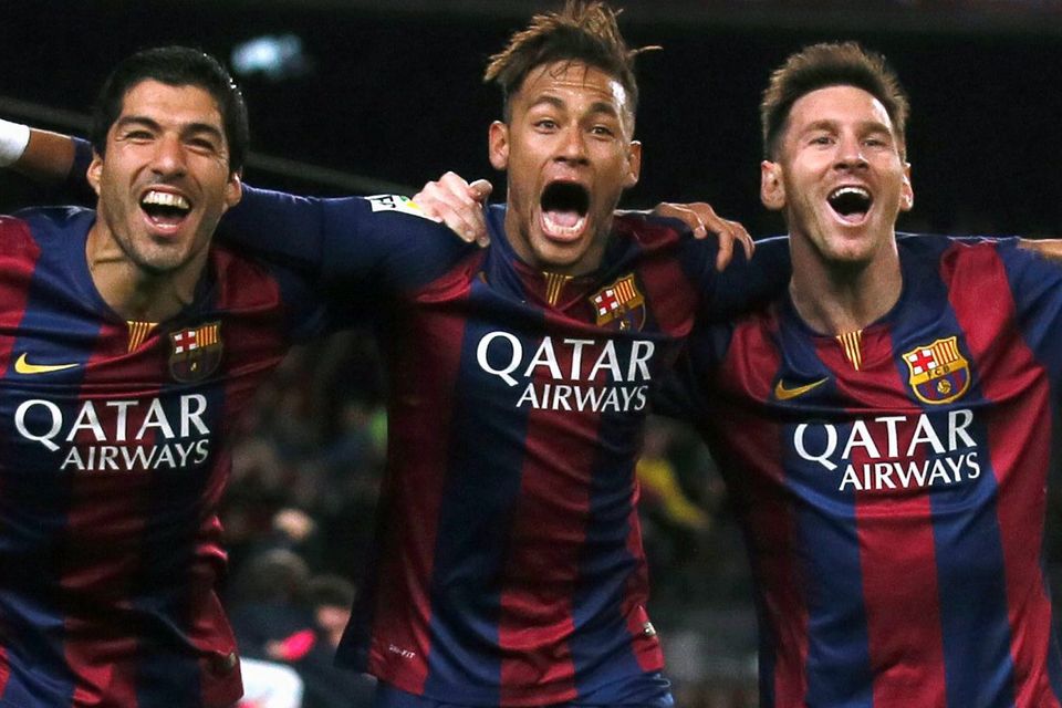 (L-R) Barcelona's Luis Suarez, Neymar and Lionel Messi celebrate a goal against Atletico Madrid