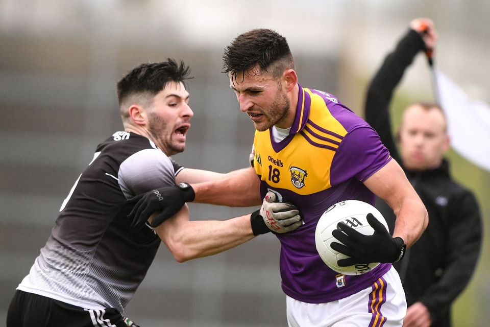 Glen Malone of Wexford in action against Nathan Mullen of Sligo during their Allianz Football League Division 4 meeting last year.