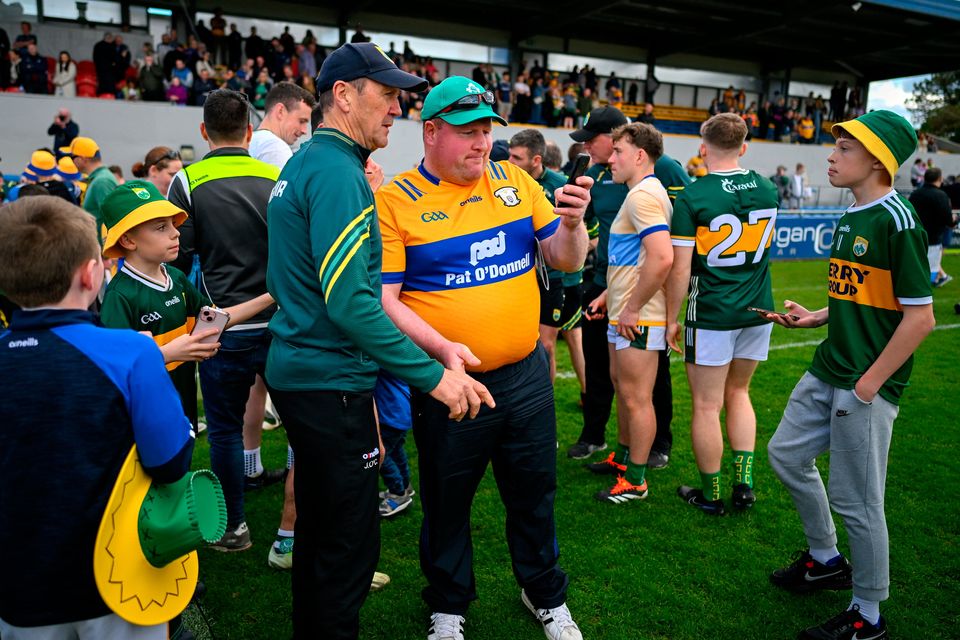 A Clare supporter takes a selfie with Kerry manager Jack O'Connor after the Munster SFC final at Cusack Park in Ennis, Clare. Photo: Brendan Moran/Sportsfile
