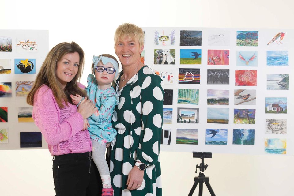 Lynsey Scallon, with her daughter Daisy (2) and Anne McLoughlin, Jack and Jill liaison nurse manager, at the launch of this year’s Incognito art sale in aid of the Jack and Jill Children’s Foundation.