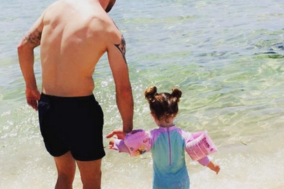Robbie Brady with daughter Halle in Sardinia. Picture: Kerrie Harris/Instagram