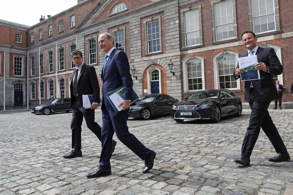 Eamon Ryan, Micheál Martin and Leo Varadkar launching the original Economic Recovery Plan in the courtyard of Dublin Castle. Photo: Julien Behal