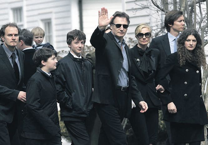 Liam Neeson and his two sons Micheal and Daniel at the funeral of his wife Natasha