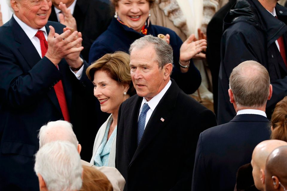 George and Laura Bush attend the inauguration ceremonies to swear in Donald Trump as the 45th president of the United States at the U.S. Capitol in Washington, U.S., January 20, 2017. REUTERS/Kevin Lamarque