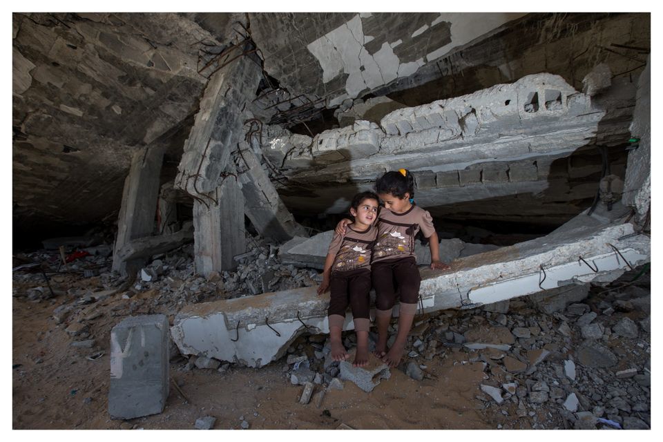 Hind (5) and Tahani Awedat (3) who were orphaned during the Gaza war in 2012 and saw their home destroyed by Israeli tanks during the 50-day war in 2014. Photo: Mark Condren