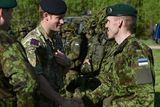 thumbnail: Prince Harry (centre) is introduced to Captain Tanel Tarlap (right), who he served alongside during his tour of Aghanistan in 2008, at a military exercise in Sangaste