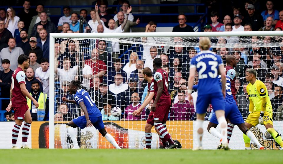 Noni Madueke (second left) celebrates scoring Chelsea’s third goal (Zac Goodwin/PA)