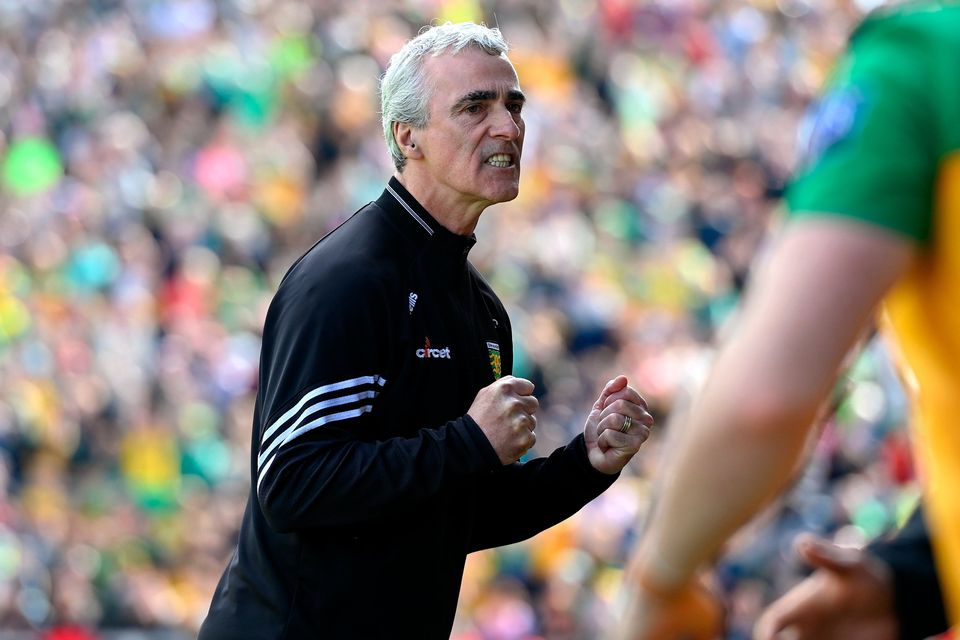 Donegal manager Jim McGuinness celebrates at the final whistle