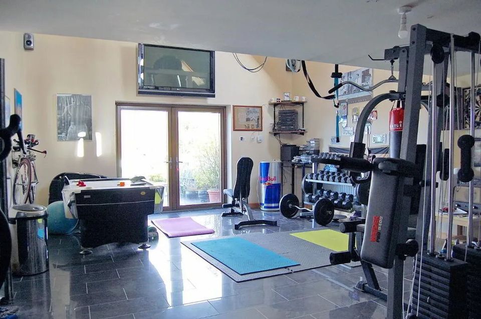 One of the garages is being used as a home gym