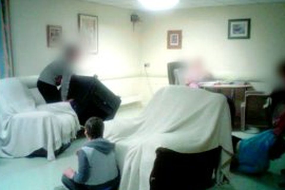 A resident of Aras Attracta residential care centre is being dragged around the floor by a staff member