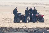 thumbnail: Armed Garda officers on a beach near Trump International Golf Links & Hotel in Doonbeg, Co Clare (PA/Niall Carson)