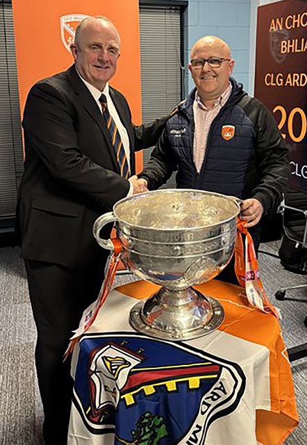 Outgoing Armagh chairman Paul McArdle, left, with new Armagh chairman Sean McAlinden