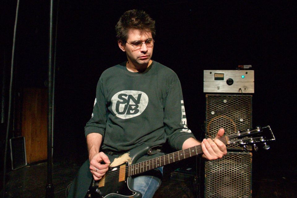 Steve Albini plays with Shellac in London in 2004. Photo: Marc Broussely/Redferns/Getty