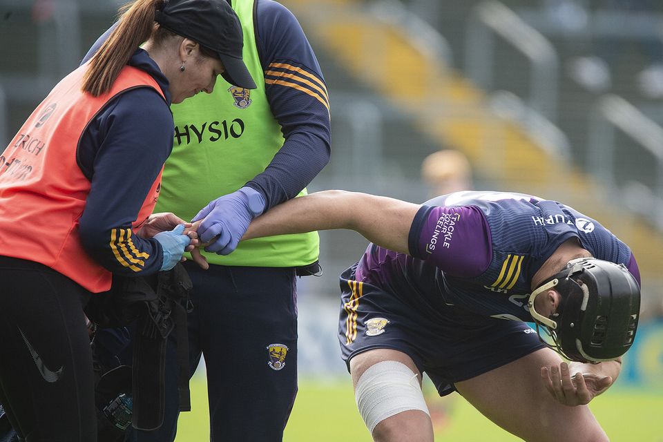 OUCH: Wexford's Jack O'Connor receiving treatment to his finger during the first-half of Wexford's win over Galway on Saturday. Photo: Jim Campbell
