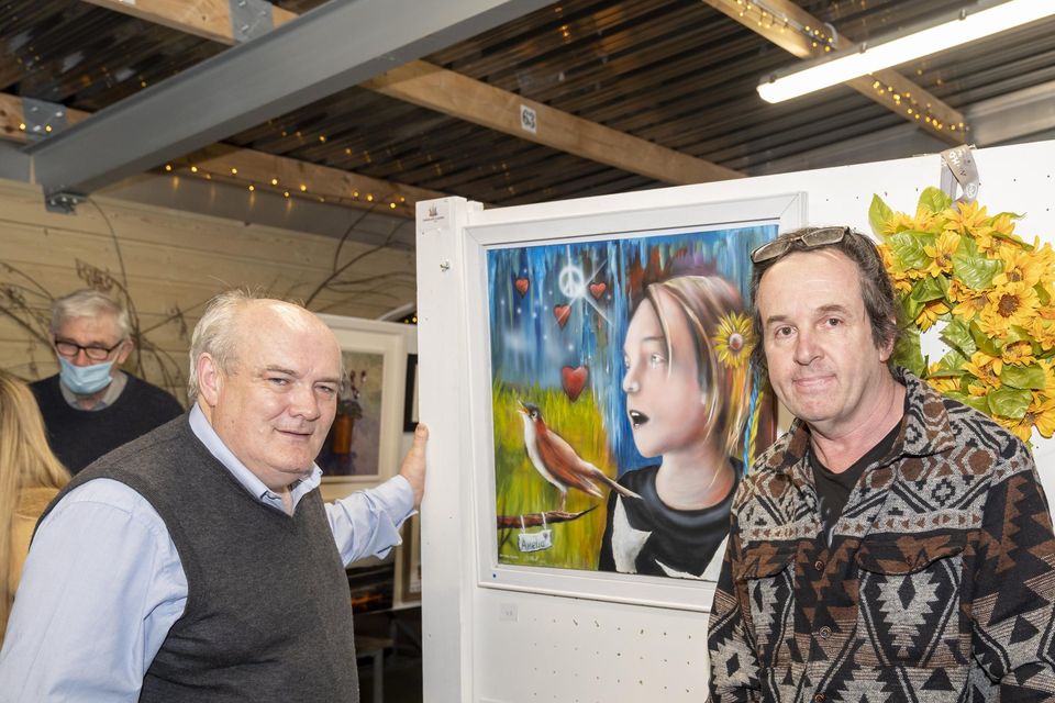 Joe Sherman, Proprietor of the Strand Bar Restaurant, Rush with artist Colin O'Neill at the "Artist for Ukraine" exhibition.