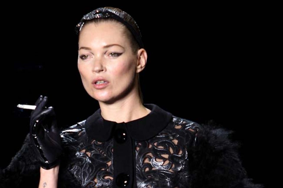 kate moss smoking as she walks the runway for louis vuitton at paris  fashion week after a smoking ban, 2011