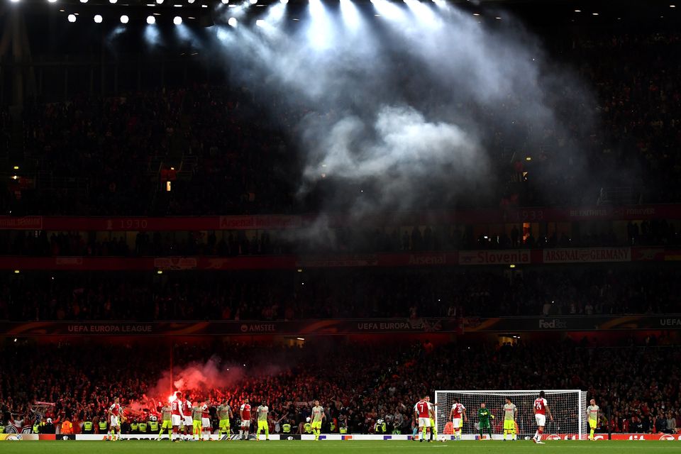 FC Koln Fans let of flares after Jhon Cordoba of FC Koeln scored the first goal during the UEFA Europa League group H match between Arsenal FC and 1. FC Koeln at Emirates Stadium on September 14, 2017 in London, United Kingdom.  (Photo by Dan Mullan/Getty Images)