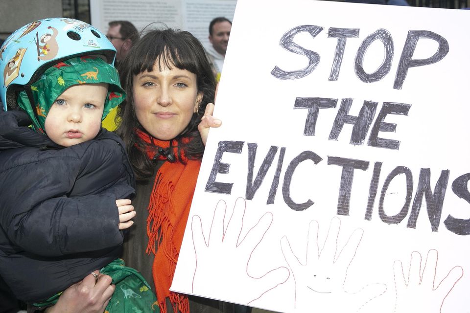 Aoife Coleman from Drumcondra with her son Adam (1) at a Dáil housing protest. Photo: Gareth Chaney