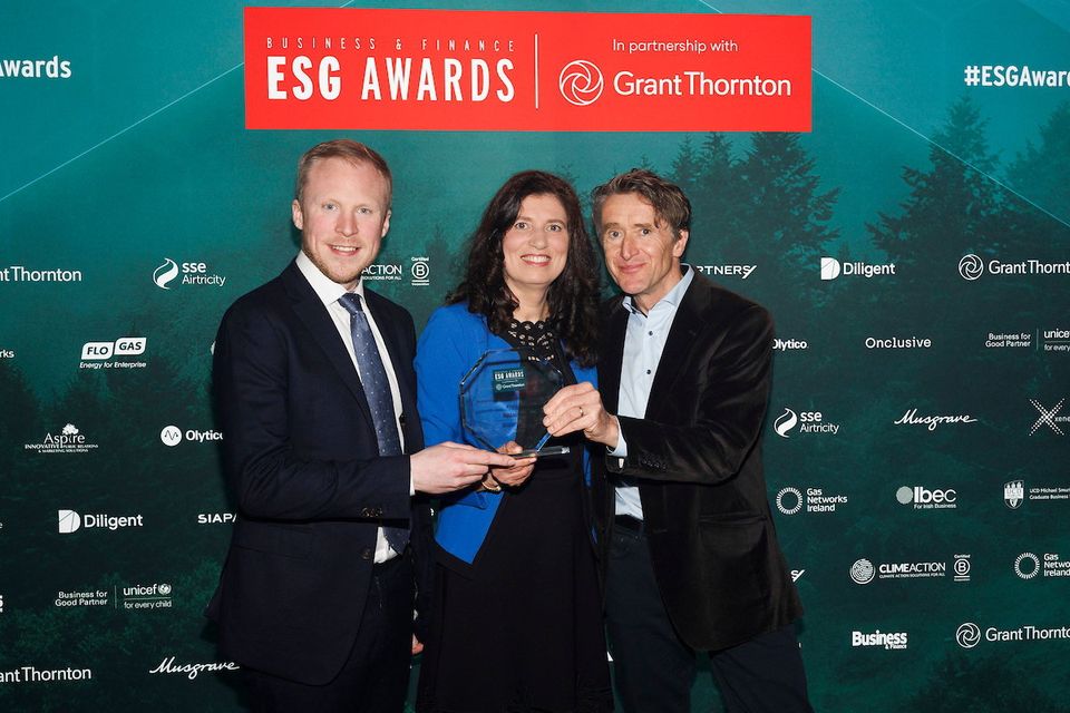 Peter Scott of Onclusive pictured presenting the Biodiversity Leadership in Business award to Gilly Taylor and Brian O’Toole, from Wildacres.
