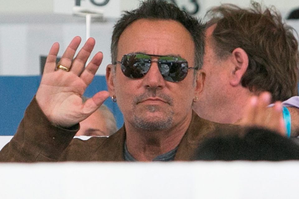 Bruce Springsteen pictured in the stands watching his daughter Jessica during her event