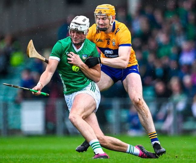 Kyle Hayes of Limerick (in green on left). Photo: Sportsfile