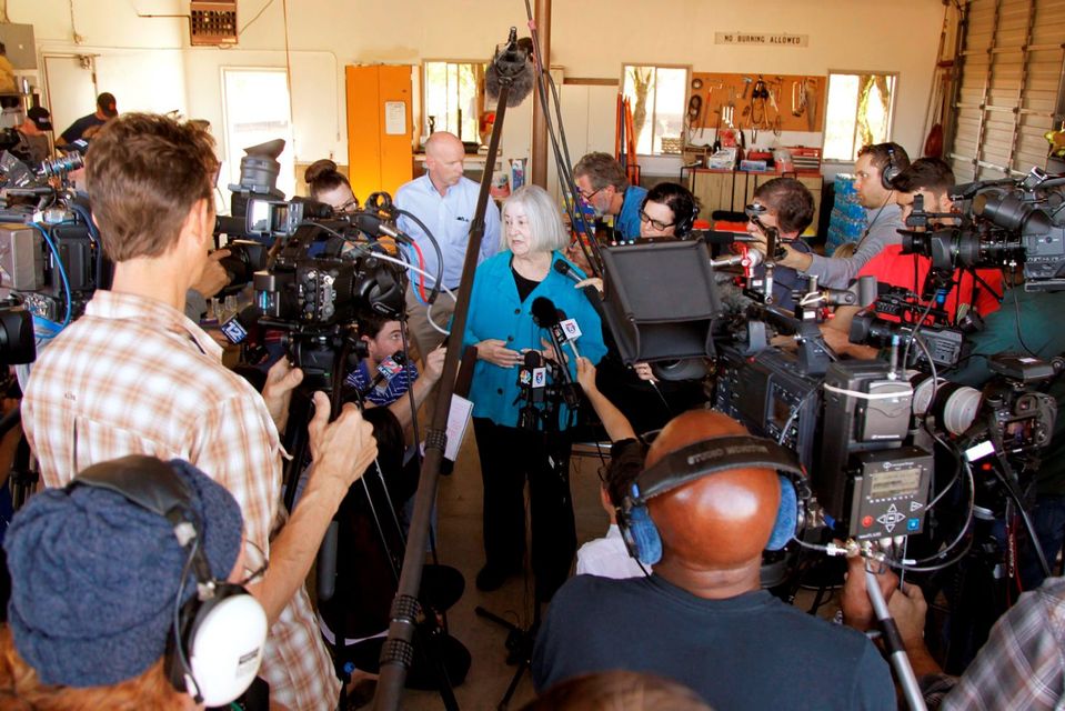 Umpqua Community College interim president Rita Cavin speaks to the media after a mass shooting at Umpqua Community College in Roseburg, Oregon October 1, 2015. A gunman opened fire at a community college in southern Oregon on Thursday, killing 13 people and wounding some 20 others before he was shot to death by police, state and county officials said, in the latest mass killing to rock a U.S. school. There were conflicting reports on the number of dead and wounded in the shooting rampage in Roseburg, which began shortly after 10:30 a.m. local time (1730 GMT).  REUTERS/Steve Dipaola