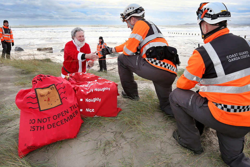 The Coast Guard rescues Santa after he fell out of his sleigh at Dollymount strand