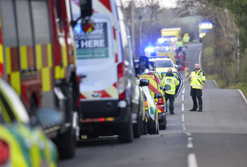 Emergency workers at the scene of the school bus crash in Co Down on Monday afternoon (Mark Marlow/PA)