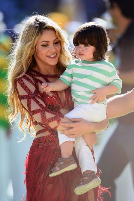 Singer Shakira and son Milan Pique look on  prior to the 2014 FIFA World Cup Brazil Final match between Germany and Argentina at Maracana