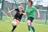 thumbnail: Carnew FC's Nicole Curran gets her shot away as Edwina Sayer closes in. 
