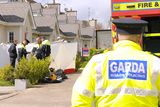thumbnail: Gardai outside a house in Mill Park where a woman's body was discovered on Tuesday morning. Pic: Jim Campbell