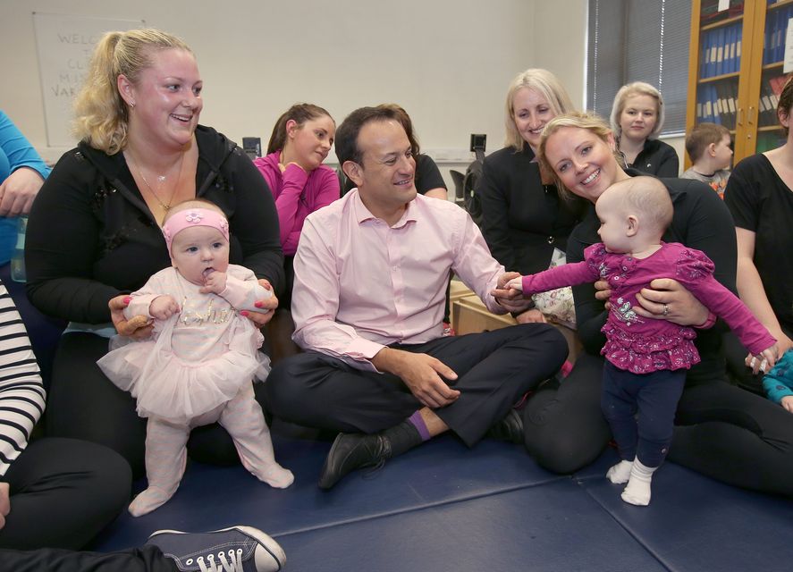 Health Minister Leo Varadkar at the Coombe Hospital, Dublin where he met Dr Niamh Daly, right, holding Noimh Cowley Kelly, nine months, and Julia Jekabsone, left, holding her daughter, Leah, aged five months