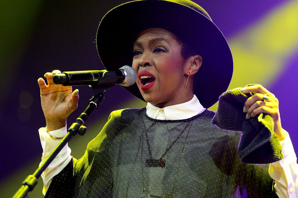 Singer/songwriter Lauryn Hill performs onstage at the Amnesty International Concert presented by the CBGB Festival at Barclays Center on February 5, 2014 in New York City.  (Photo by Theo Wargo/Getty Images for CBGB)