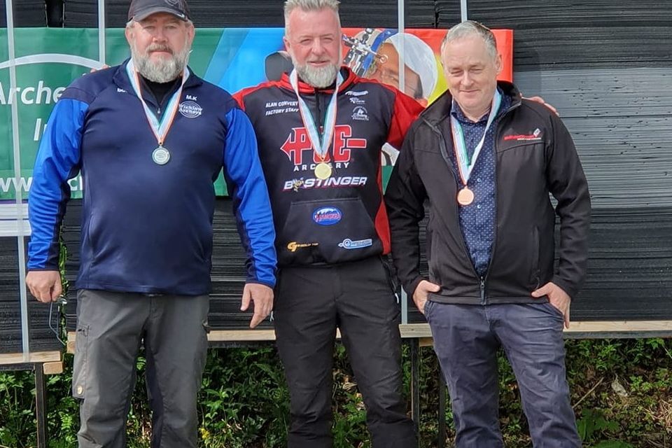 Winners of masters' compound category, with CúChulainn Archers members Alan Convery in first place and Philip Fitzpatrick in third place.