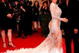thumbnail: Kim Kardashian West (L) and Kanye West attend the "China: Through The Looking Glass" Costume Institute Benefit Gala at the Metropolitan Museum of Art on May 4, 2015 in New York City.  (Photo by Dimitrios Kambouris/Getty Images)