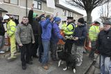 thumbnail: Water meter Protestors beside a GMC Sierra worker and members of the Gardai on Our Ladys Road in Crumlin. Picture credit; Damien Eagers