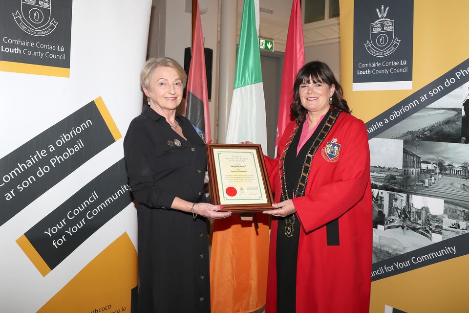 Margaret Geraghty accepts the award on behalf of Drogheda Soroptimists. 