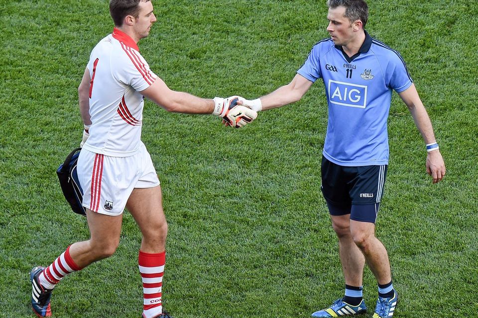 Dublin’s Alan Brogan (right) shakes hands with Cork’s Ken O’Halloran after the Rebels’ 17-point collapse during last year’s league semi-final