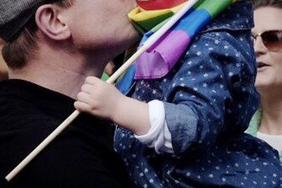 Amy's husband Brian O’Driscoll with their daughter Sadie outside Dublin Castle celebrating the yes result in Ireland's same sex marriage referendum in 2015. Photo: El Keegan