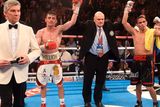 thumbnail: Anthony Crolla (2nd left) after his WBA World Lightweight Championship fight against Darleys Perez was called a draw with announcer Michael Buffer (left), at Manchester Arena, Manchester