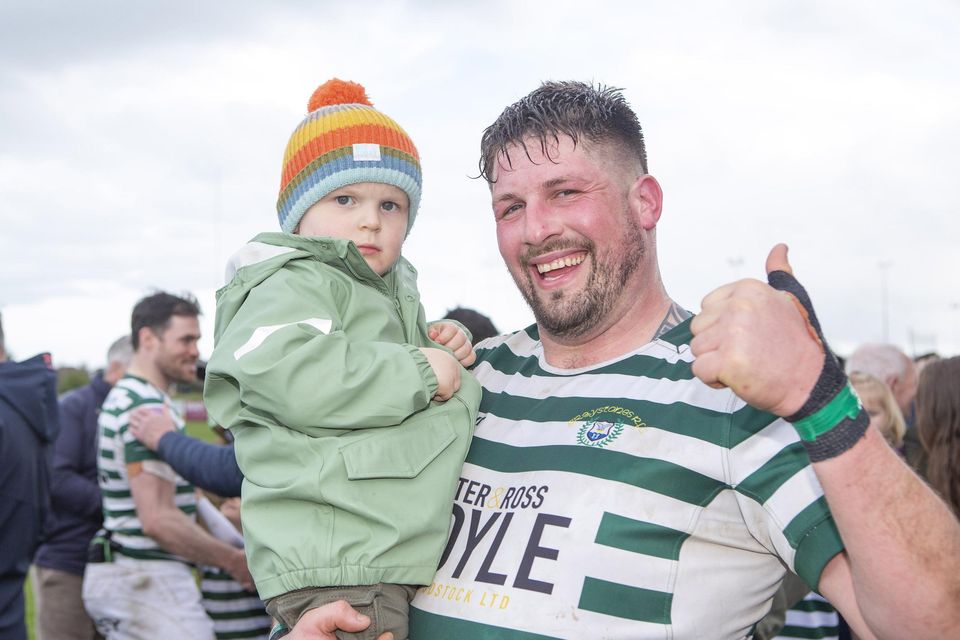 Jack and Ben Diaper celebrate as Greystones make the step up to AIL Division 2A following their win over Galway Corinthians at Dr. Hickey Park.
