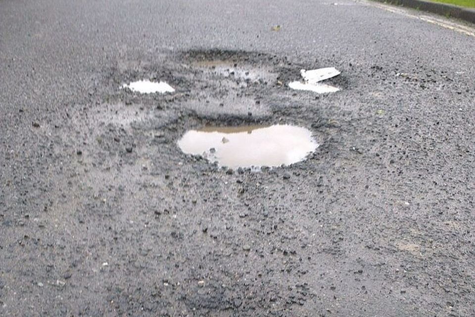 Stock image of potholes.