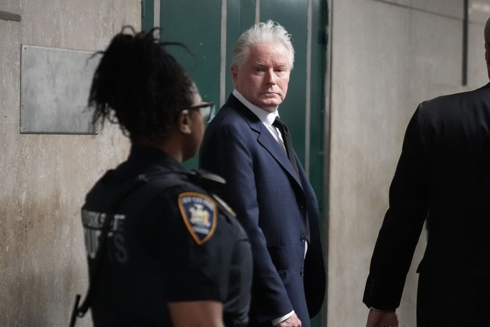 Don Henley leaves the court in New York after giving evidence (AP Photo/Mary Altaffer)