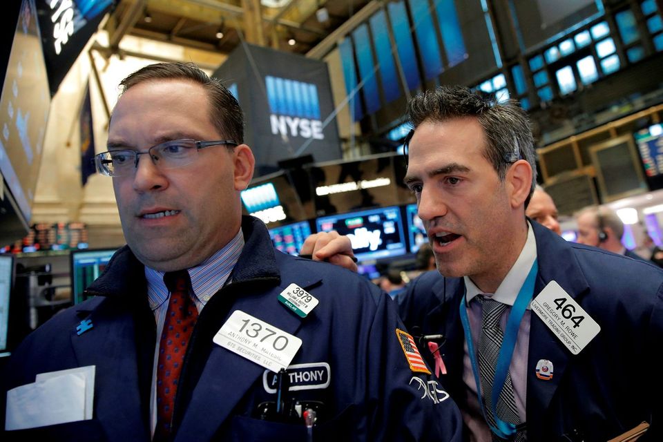 Traders work on the floor of the New York Stock Exchange (NYSE) in New York City. Photo: Reuters