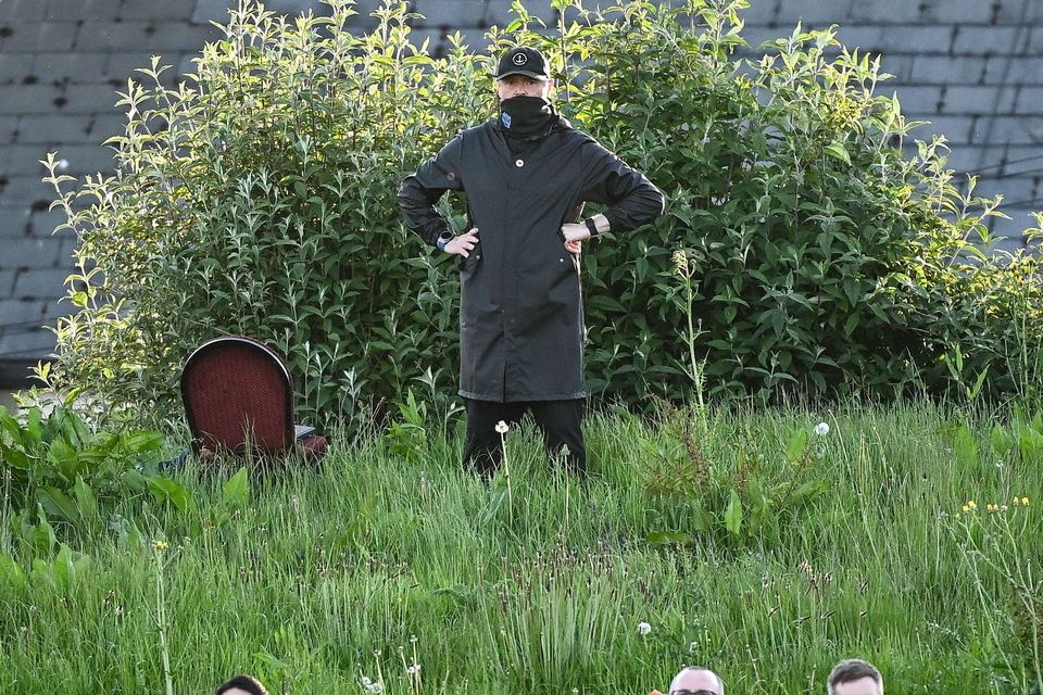 Shelbourne manager Damien Duff watches their game against Bohemians from a grassy knoll at Dalymount. Photo: Seb Daly/Sportsfile