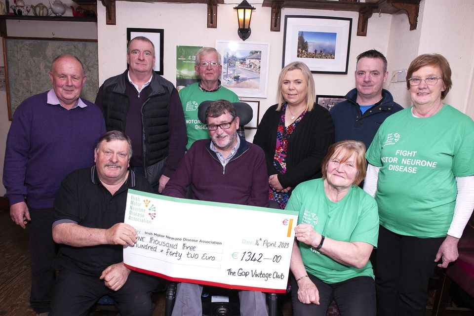 The Gap Vintage Club presented a cheque for €1342 to the Irish Motor Neurone Disease Association proceeds from their recent road run. Pictured at the presentation in The Gap Pub recently were Jim Dixon, Andy Greene, Con Carroll. Linda Greene, James Kinsella, Mary Carroll. Front- Mick Darcy, John Carroll (who passed away a week later), Peggy Darcy. Pic: Jim Campbell.