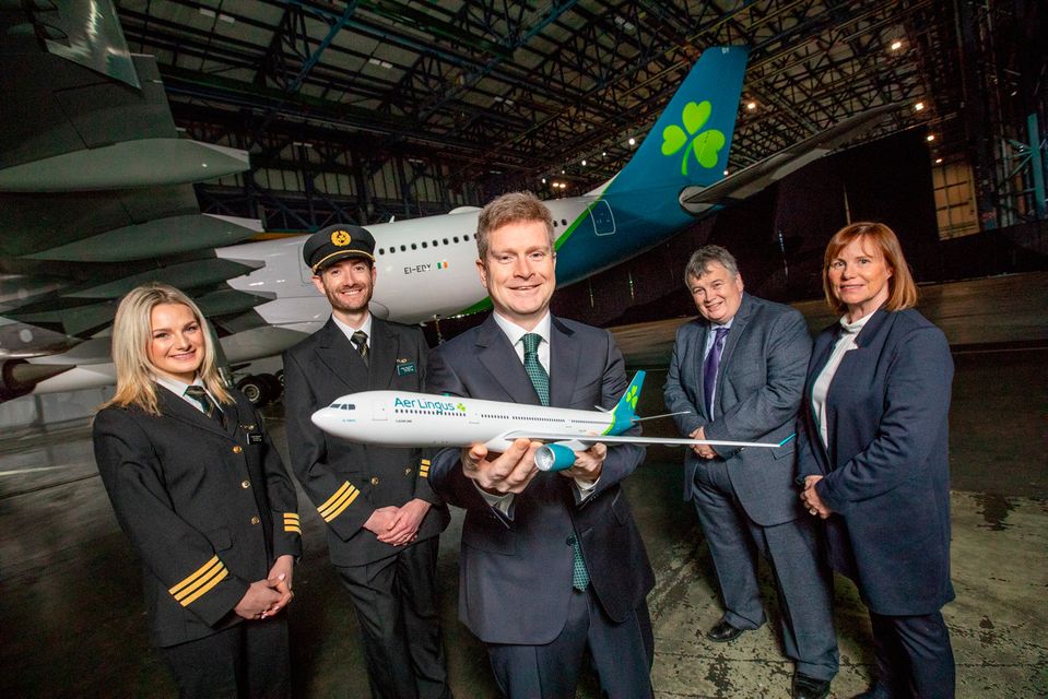 Pictured at the Aer Lingus brand reveal in front of an Airbus A330 freshly painted in the new aircraft livery was from left First Officer Laura Bennett;First Officer Niall McCauley;Sean Doyle, Aer Lingus Chief Executive; Mike Rutter, Aer Lingus Chief Operating Officer;and Dara McMahon, Aer Lingus Director of Marketing. Pic:Naoise Culhane