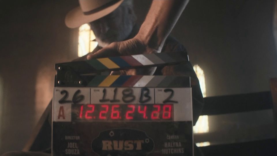 Actor Alec Baldwin practising drawing his revolver on the set of the Rust movie (Santa Fe County Sheriff/PA)