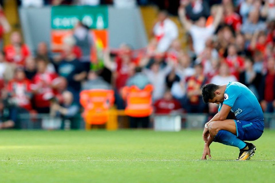 Arsenal's Alexis Sanchez looks dejected