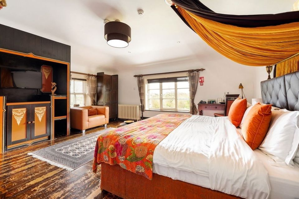 The former boutique hotel and wedding venue has several themed bedrooms.
